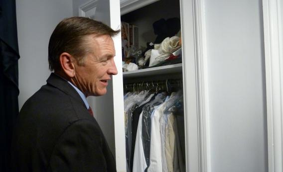 Congressman Paul Gosar, Republican of Arizona, opens his closet.