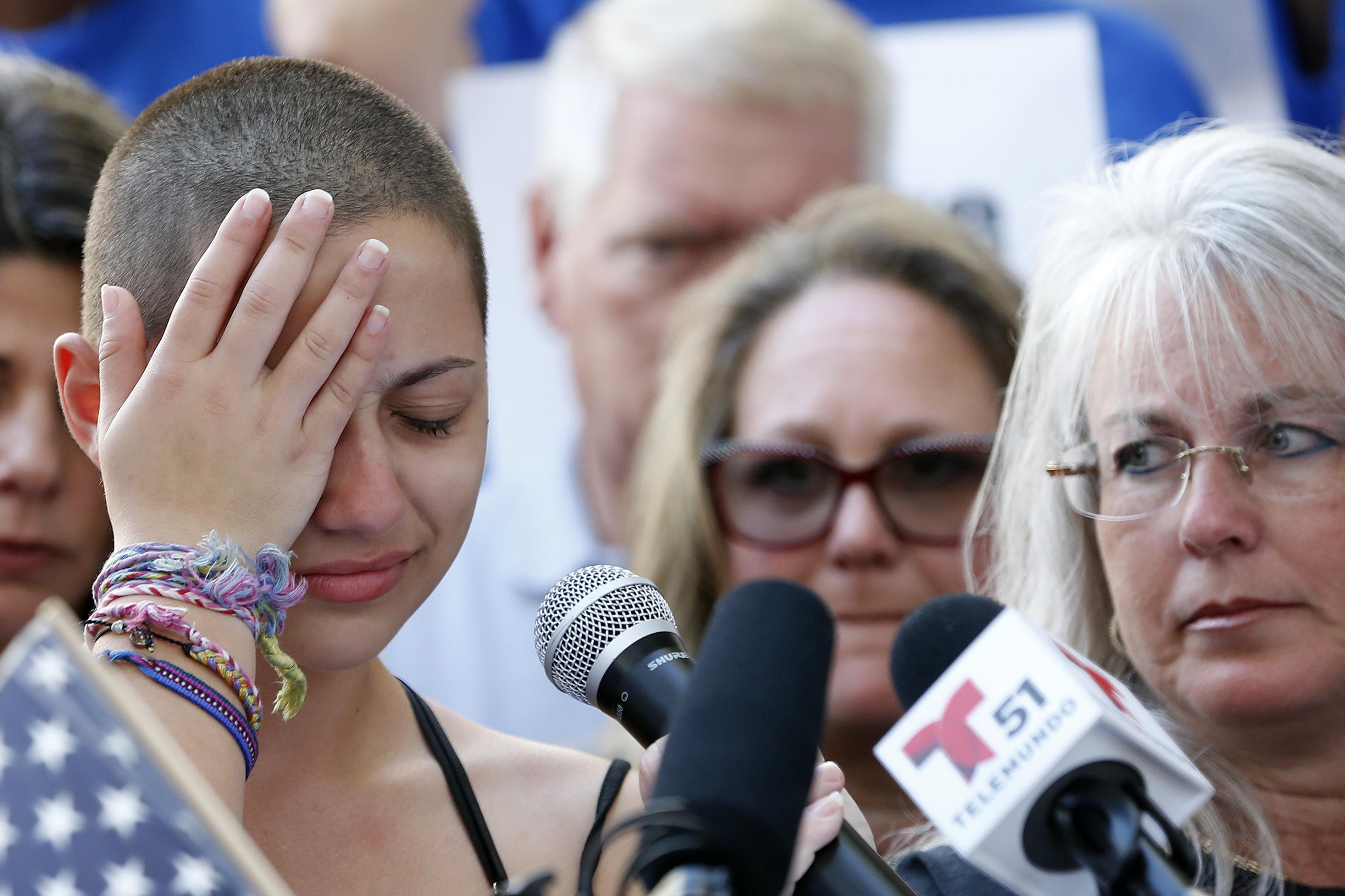 Marjory Stoneman Douglas High School student Emma Gonzalez reacts during her speech at a rally for gun control at the Broward County Federal Courthouse in Fort Lauderdale, Florida on February 17, 2018. 