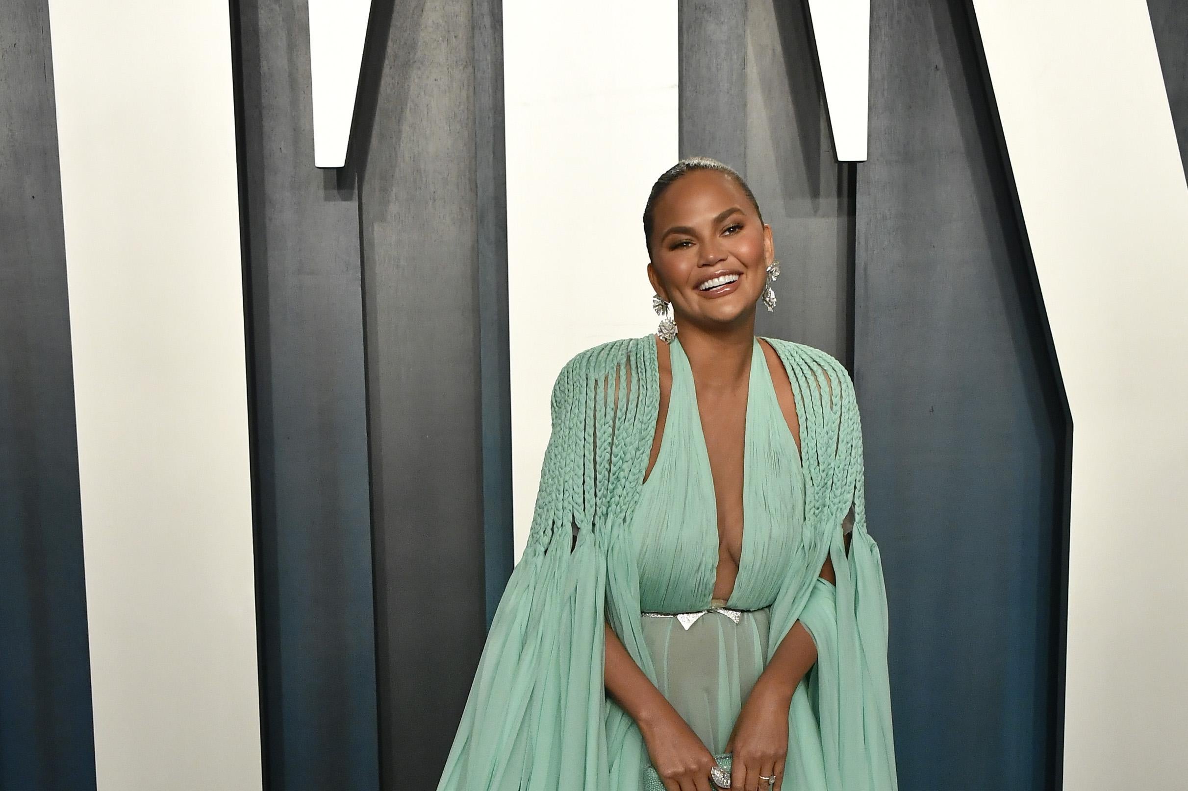 Chrissy Teigen attends the 2020 Vanity Fair Oscar Party hosted by Radhika Jones at the Wallis Annenberg Center for the Performing Arts on Feb. 9, 2020, in Beverly Hills, California.