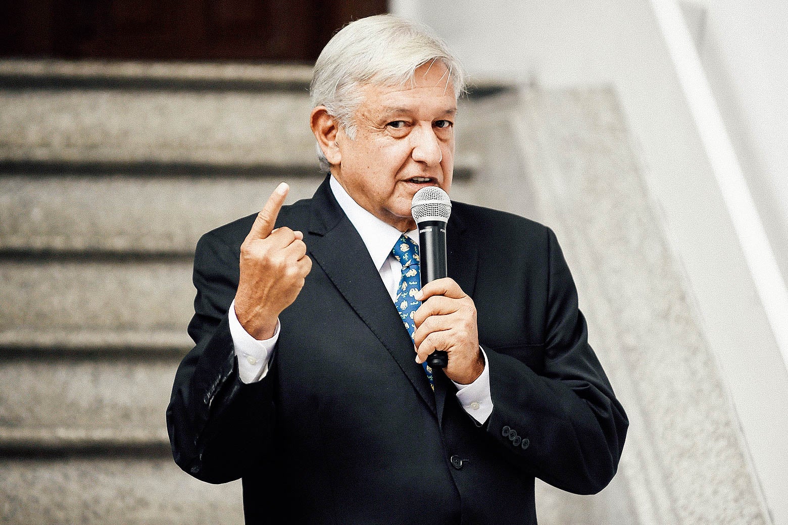 Mexico President-elect Andrés Manuel López Obrador speaking into a mic.