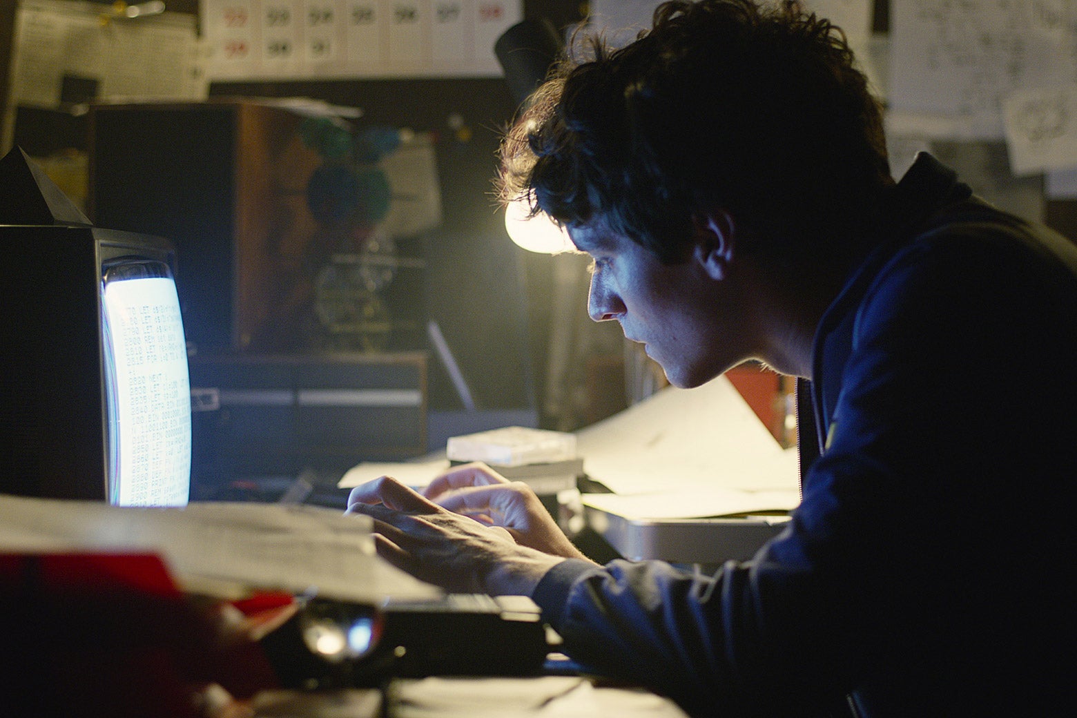 A man doing work at his computer.