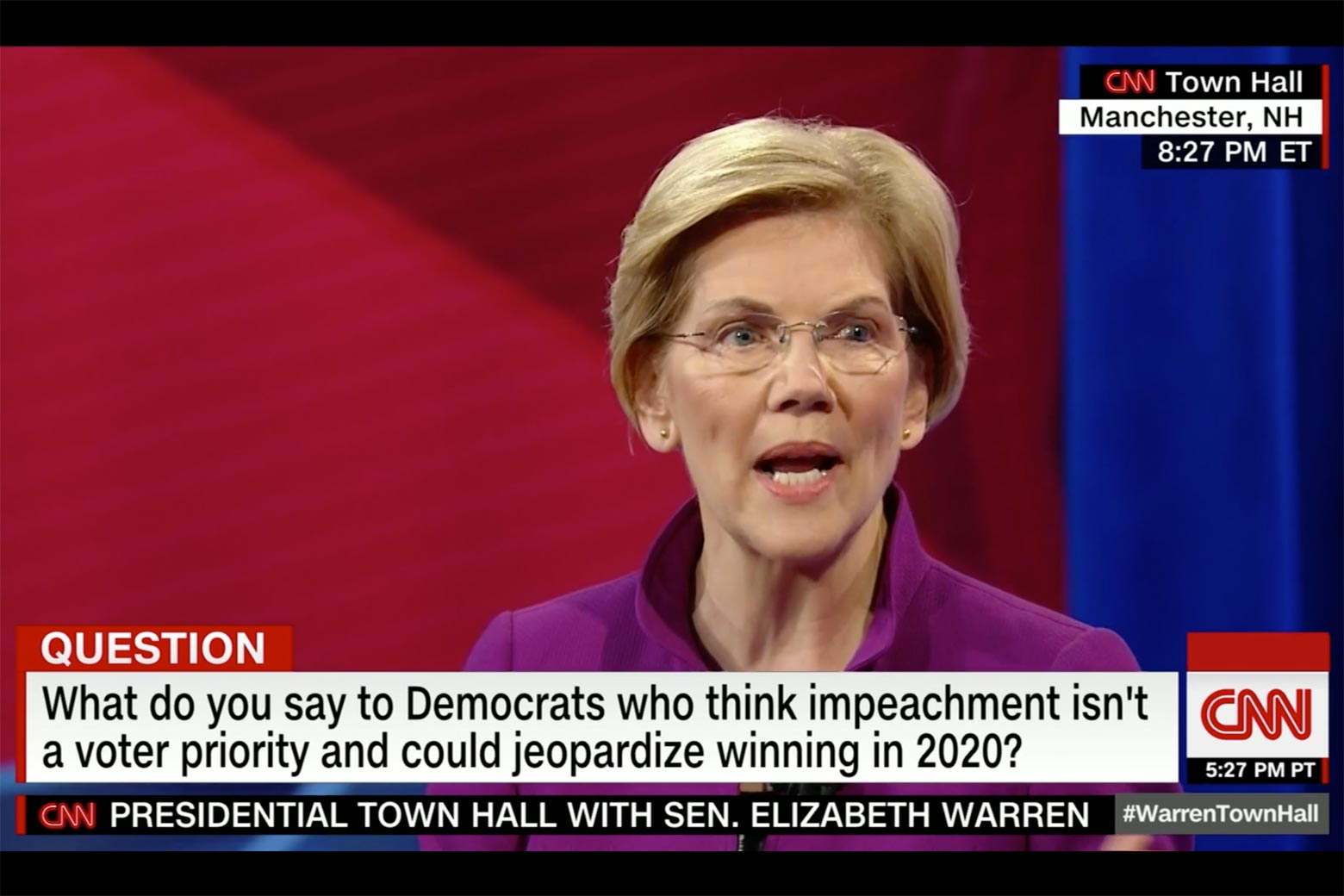 Elizabeth Warren shown on screen answering questions on CNN.