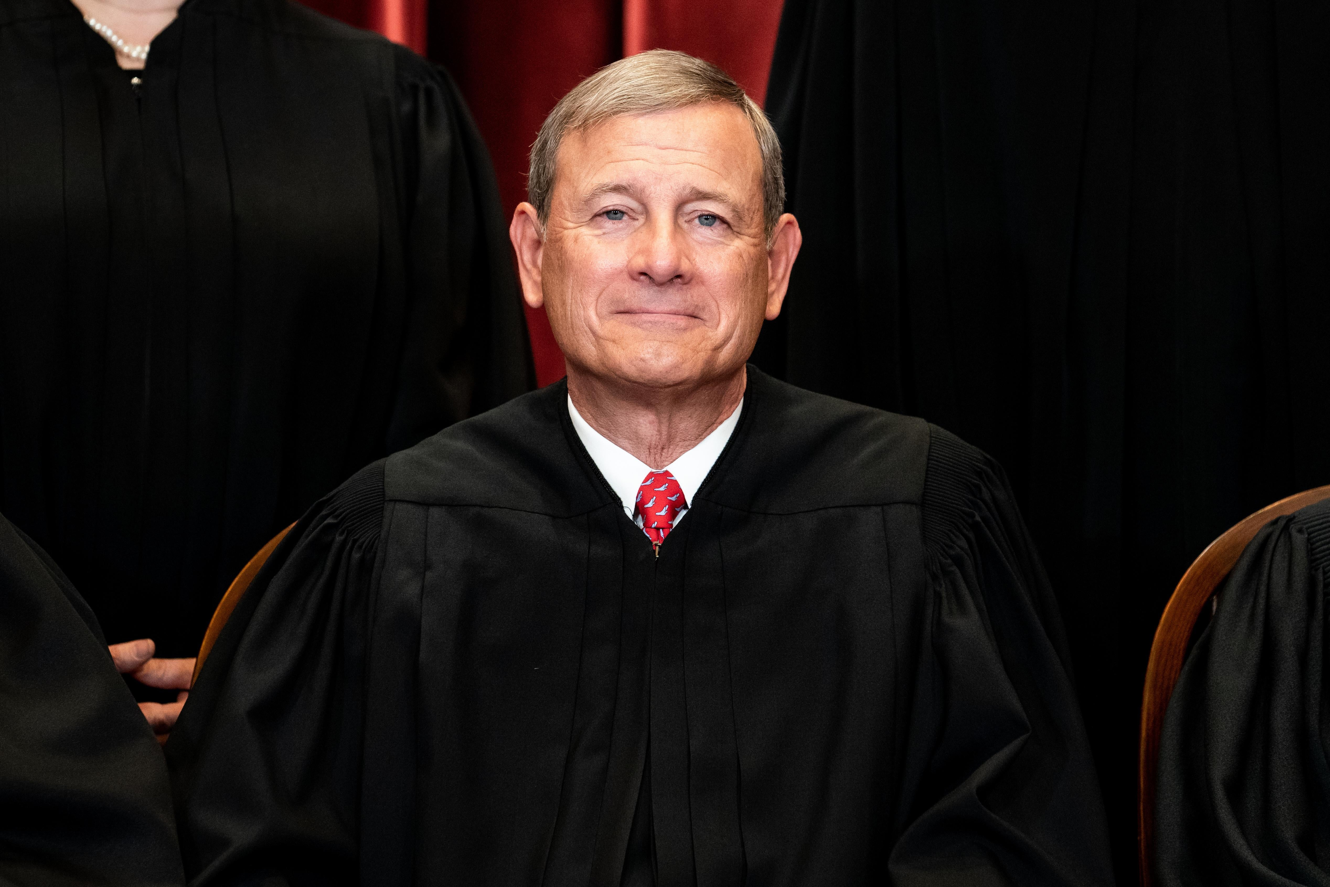John Roberts in robes for a group photo with the justices.