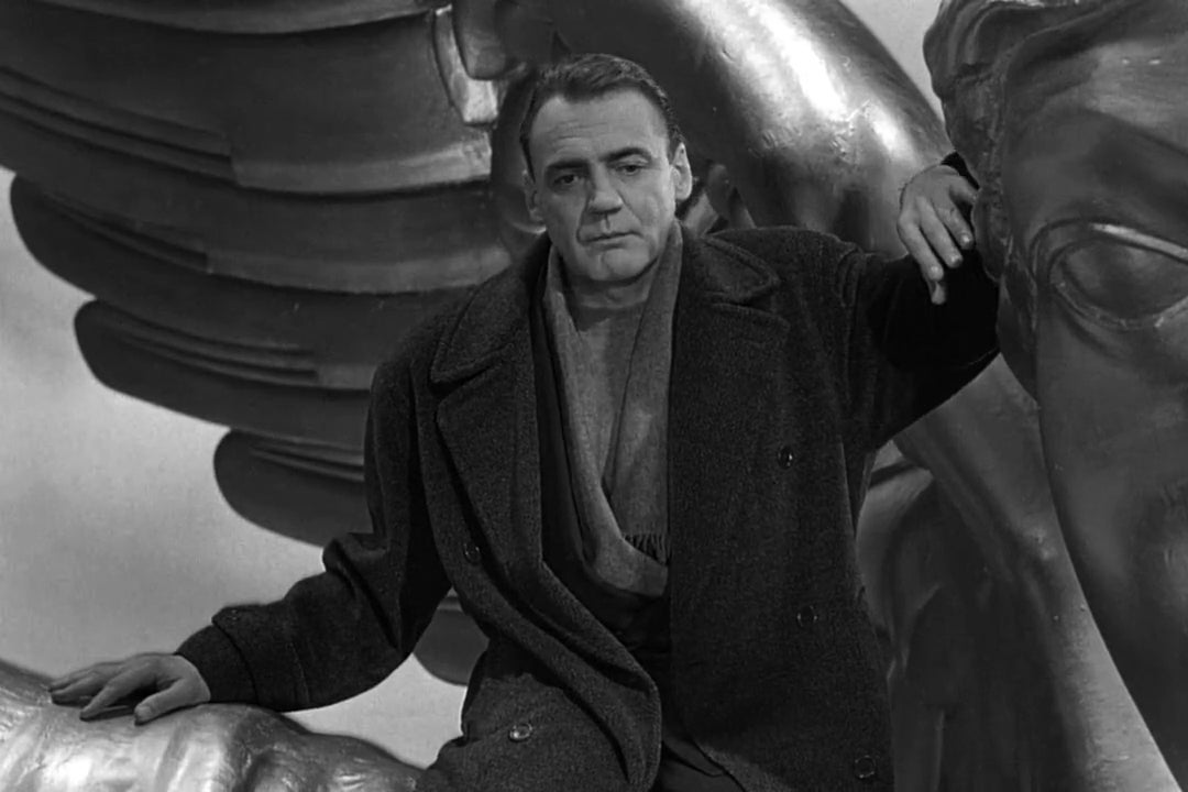 Bruno Ganz playing an angel in Wings of Desire.