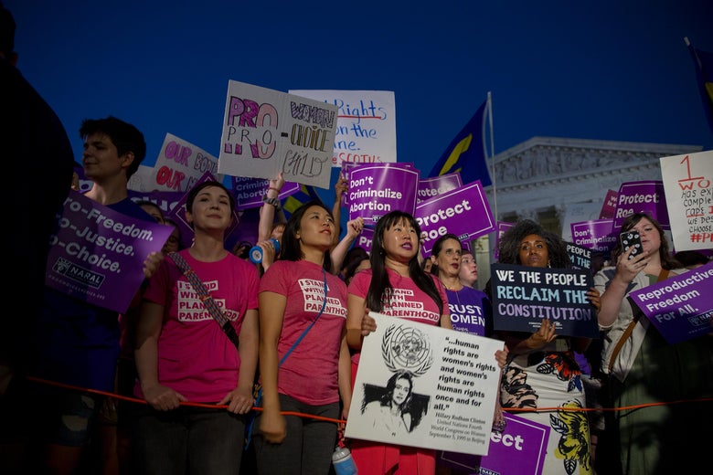 Pro-choice and anti-abortion protesters demonstrate in front of the U.S. Supreme Court on July 9, 2018.