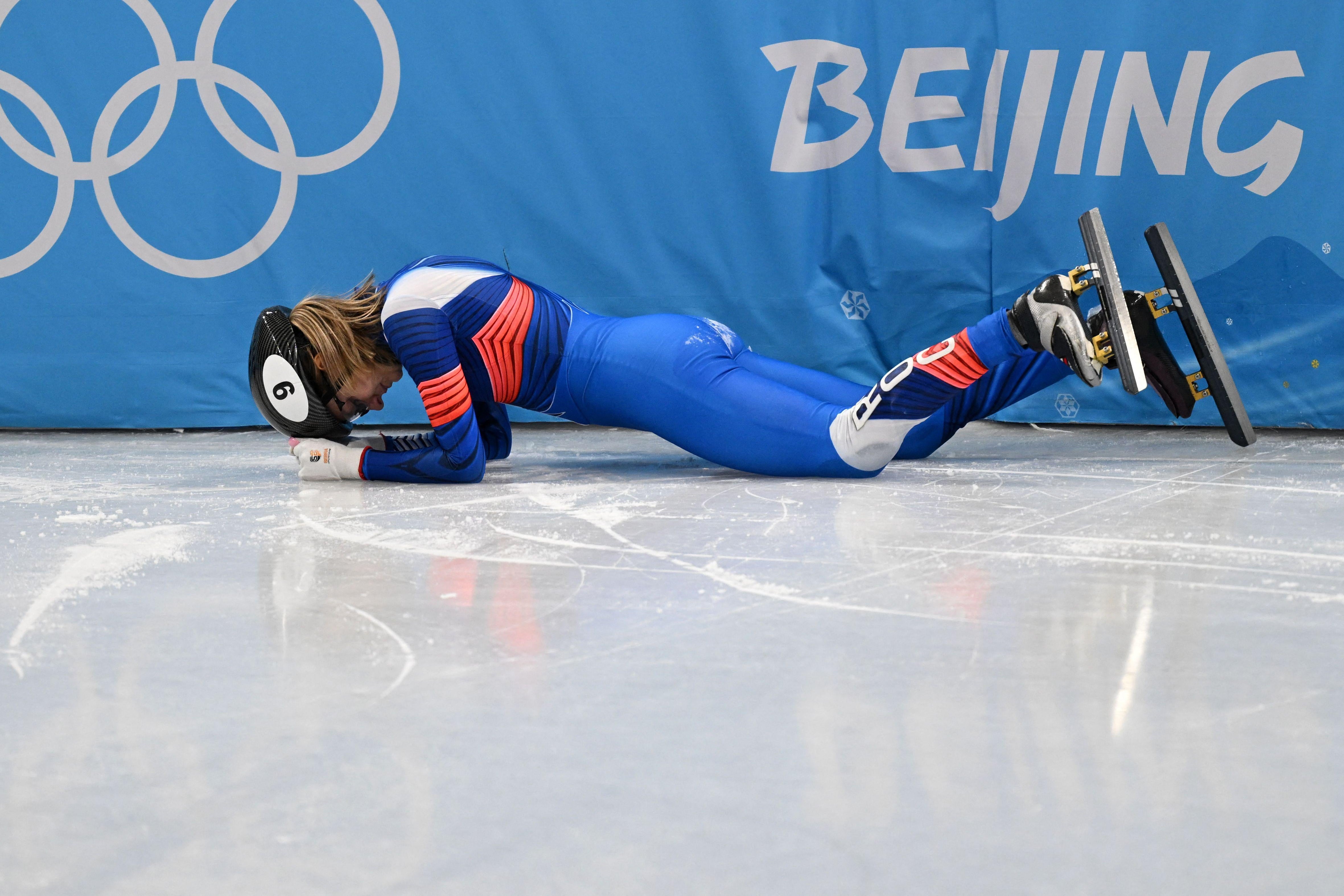 Speedskater face down on the ice