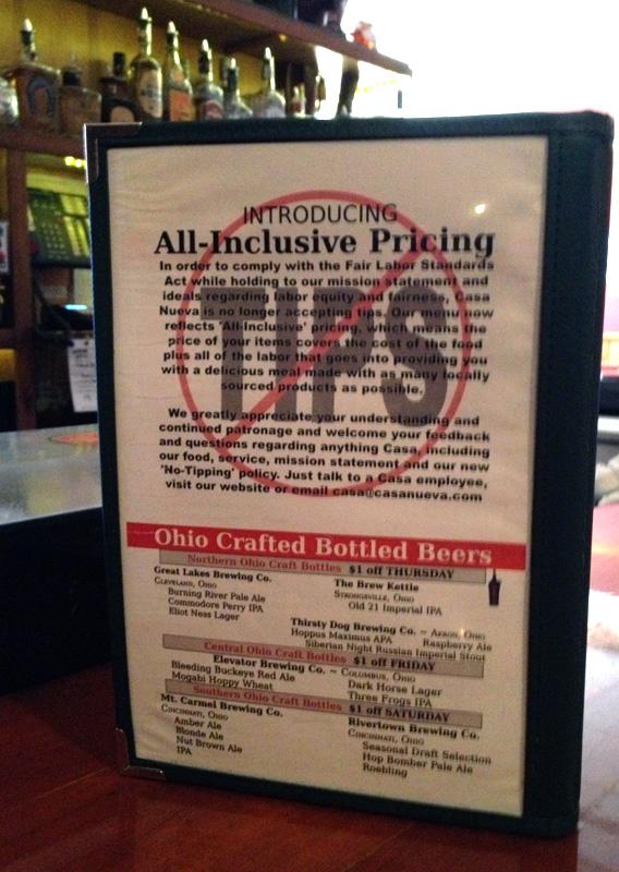 The menu at Casa Nueva reminding patrons not to tip.