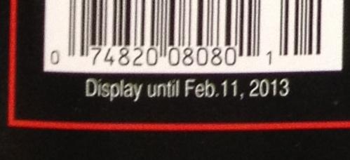 Close up of a "sell by" date on the magazine cover