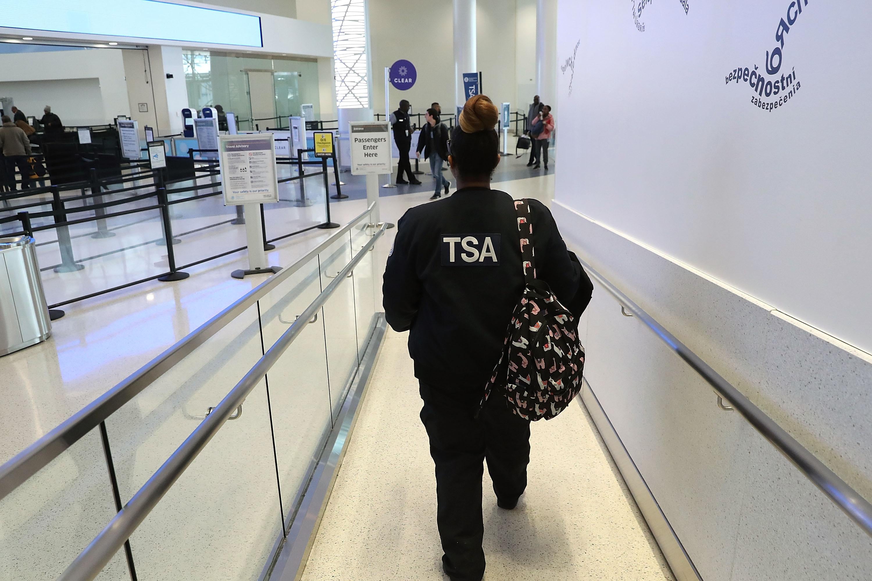 TSA employee walking through airport