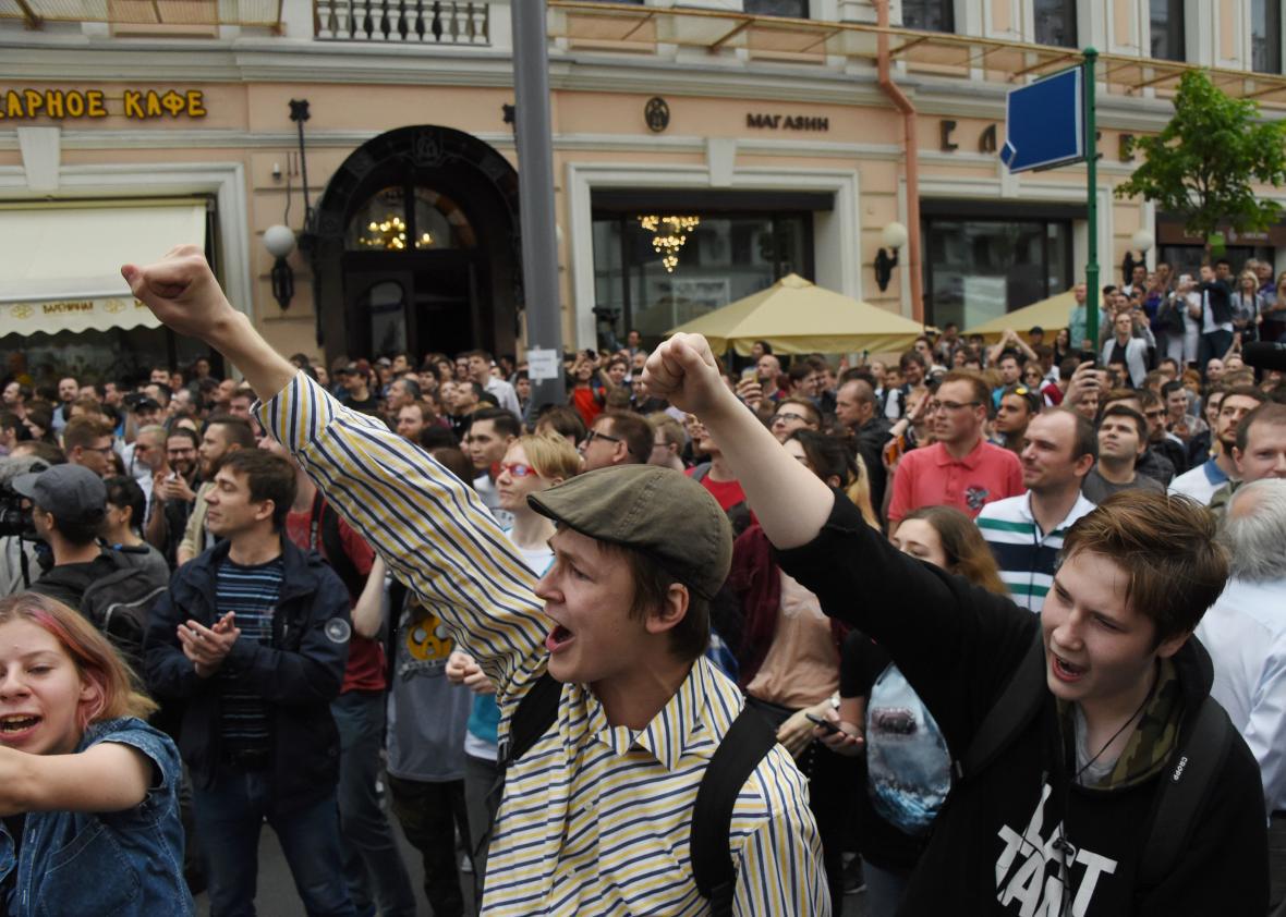 People chant slogans during an unauthorized opposition rally in Moscow on June 12, 2017. 