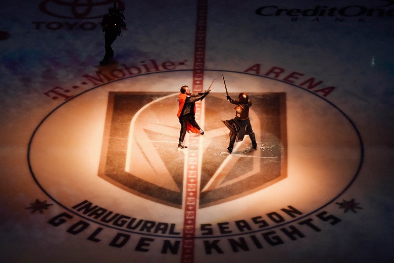 Zack Frongillo, representing the Washington Capitals, battles Lee Orchard as the Golden Knight during a pregame show before Game 1 of the 2018 NHL Stanley Cup Final between the Capitals and the Vegas Golden Knights at T-Mobile Arena on Monday in Las Vegas.