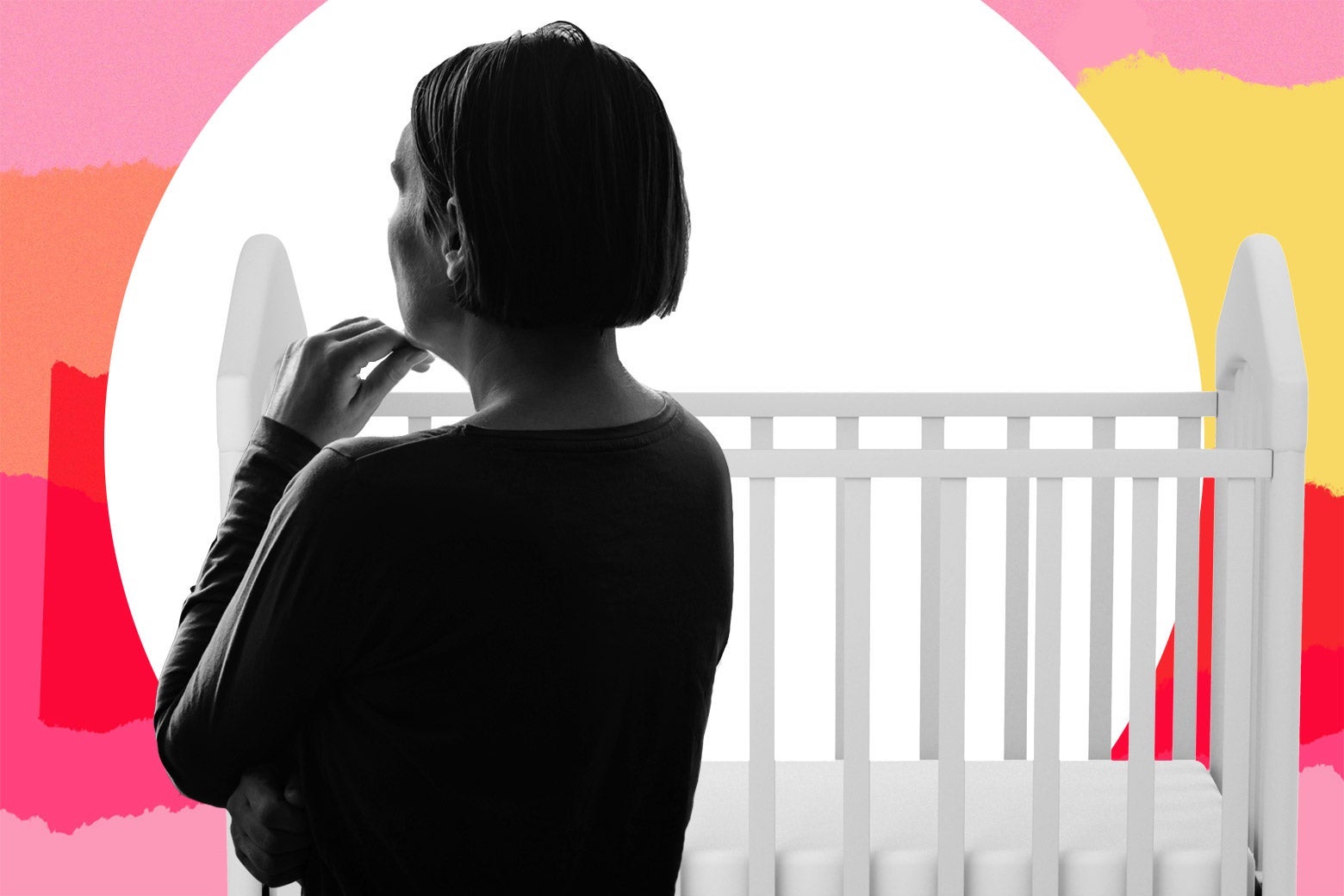 A pensive woman, hand on her chin, looking away from a baby crib.