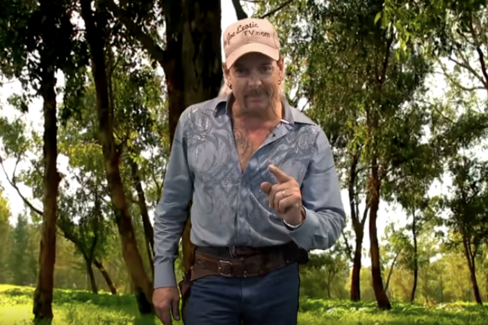 A still from a YouTube video showing Joe Exotic standing outside