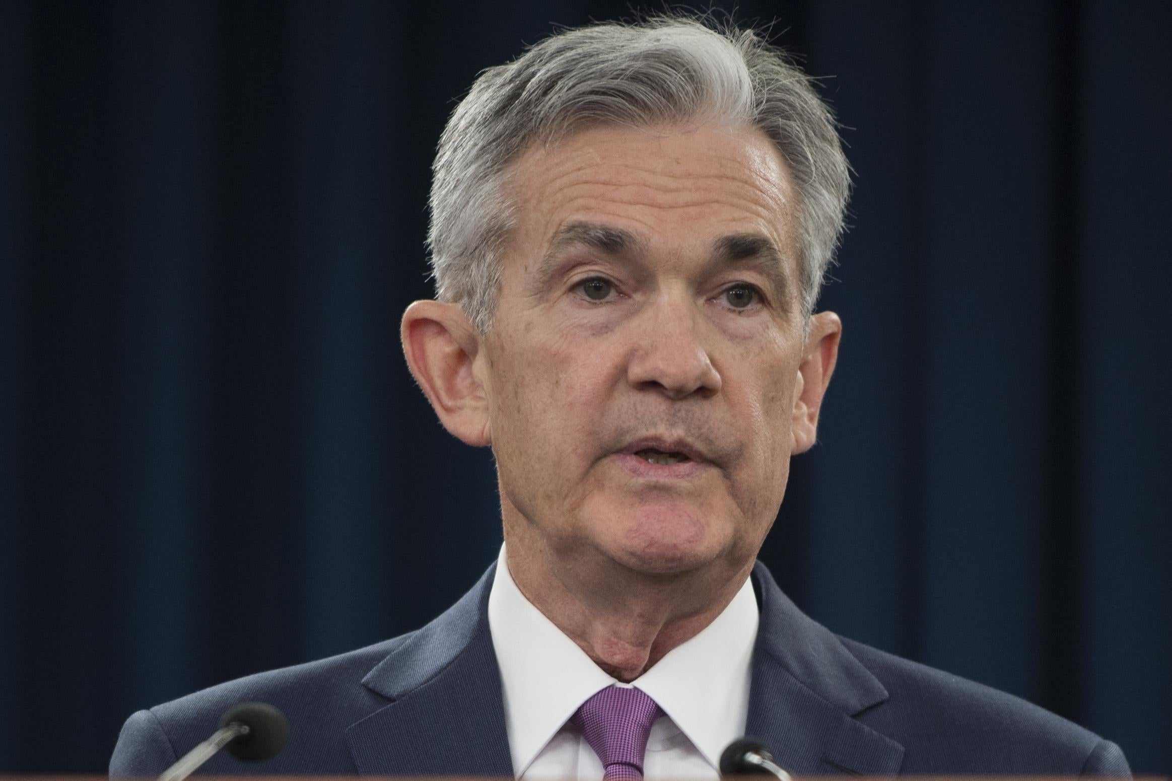 Federal Reserve Board Chairman Jerome Powell speaks during a news conference  in Washington DC on June 13, 2018. - The US Federal Reserve raised the benchmark lending rate on Wednesday, the second increase of the year, and signaled two more hikes were coming in 2018 and four in 2019, a possible sign of concern about accelerating inflation. (Photo by Andrew CABALLERO-REYNOLDS / AFP)        (Photo credit should read ANDREW CABALLERO-REYNOLDS/AFP/Getty Images)