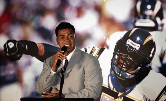Junior Seau speaks during a press conference to announce his retirement from the NFL on August 14, 2006