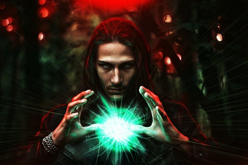 Wizard-looking man with a mysterious glowing orb.