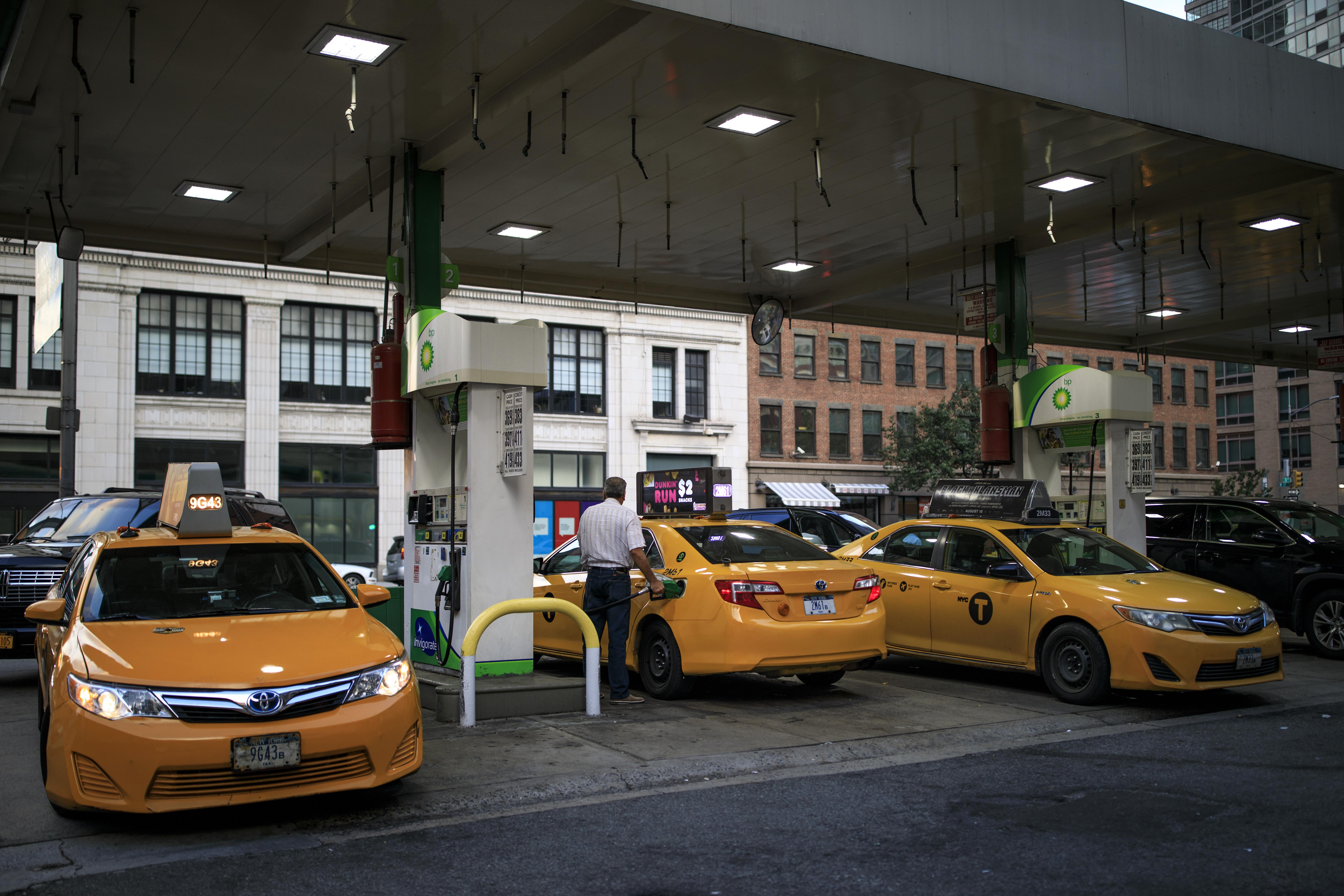 NEW YORK, NY - AUGUST 8: Taxi cabs fill up at a BP Gas station on the West Side of Manhattan, August 8, 2018 in New York City. On Wednesday, New York City became the first American city to halt new vehicles for ride-hail services. The legislation passed by the New York City Council will cap the number of for-hire vehicles for one year while the city studies the industry. The move marks a setback for Uber in its largest U.S. market. (Photo by Drew Angerer/Getty Images)