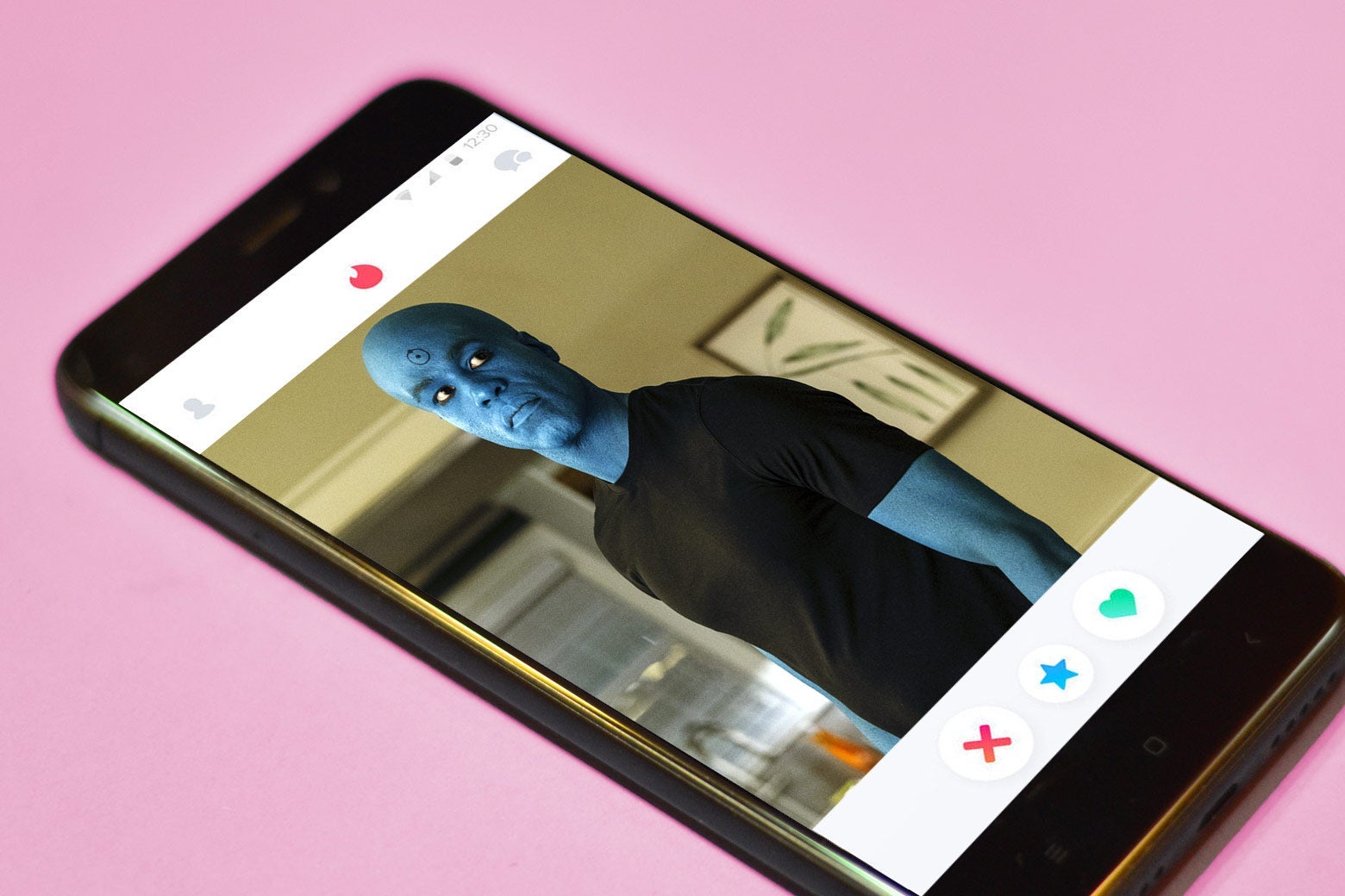 A phone screen with an imaginary Tinder profile for Doctor Manhattan on it.