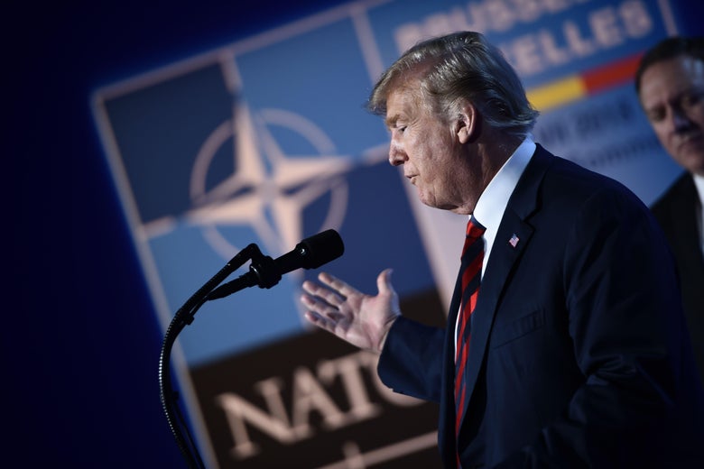 President Donald Trump gestures as he addresses a press conference at the NATO summit in Brussels on Thursday.