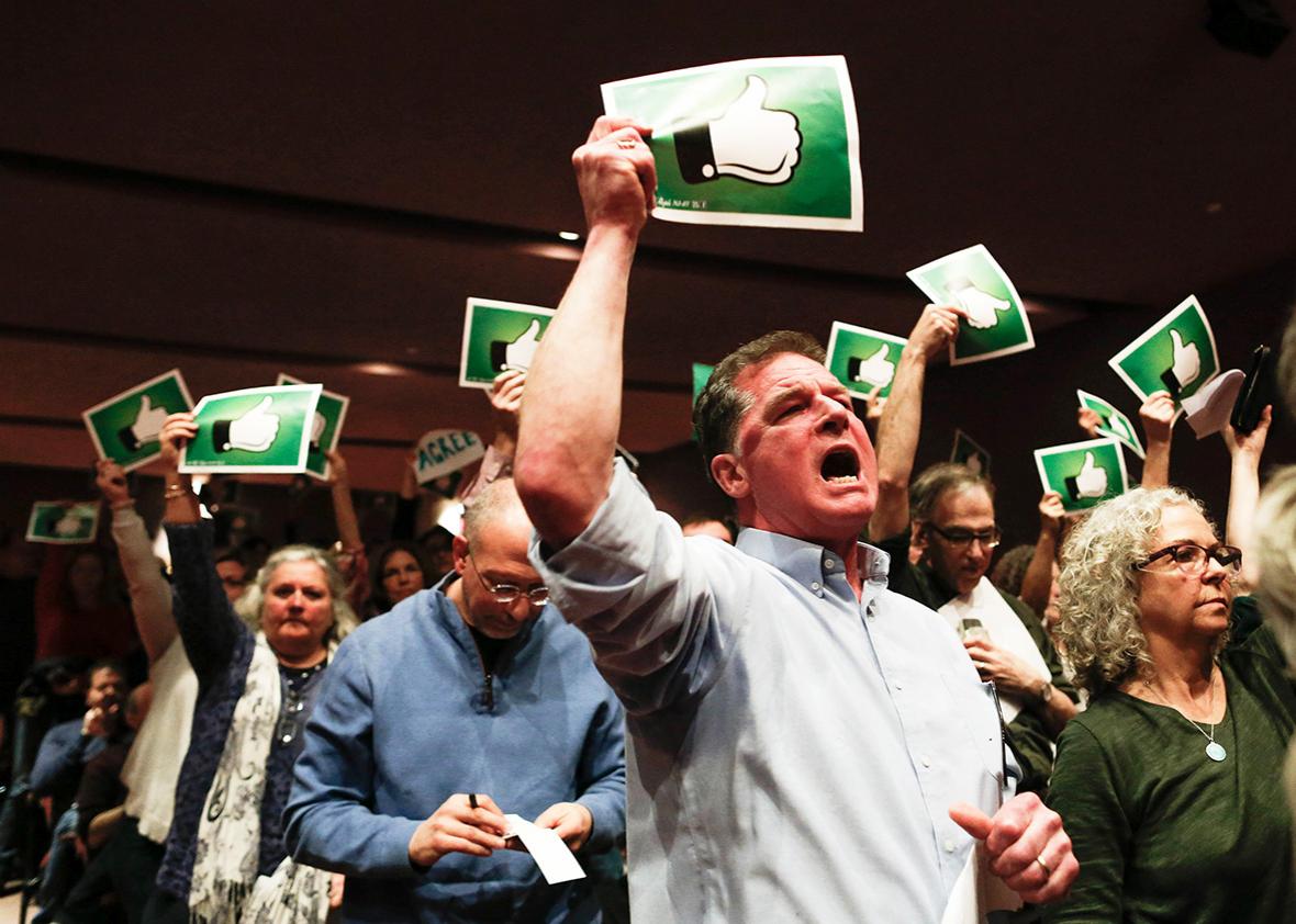 Constituents react after U.S. Congressman Leonard Lance responded to questions during a town hall event at the Edward Nash Theater on the campus of Raritan Valley Community College on February 25, 2017 in Branchburg, New Jersey. 