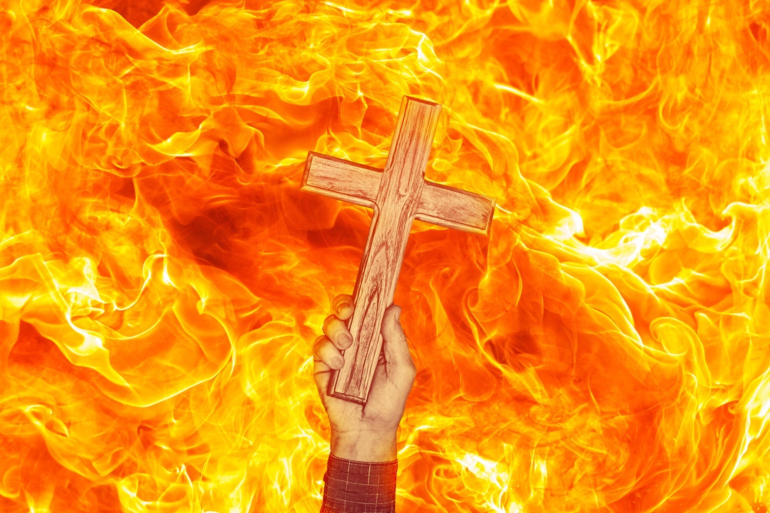 A hand holds a cross aloft within a sea of flames.