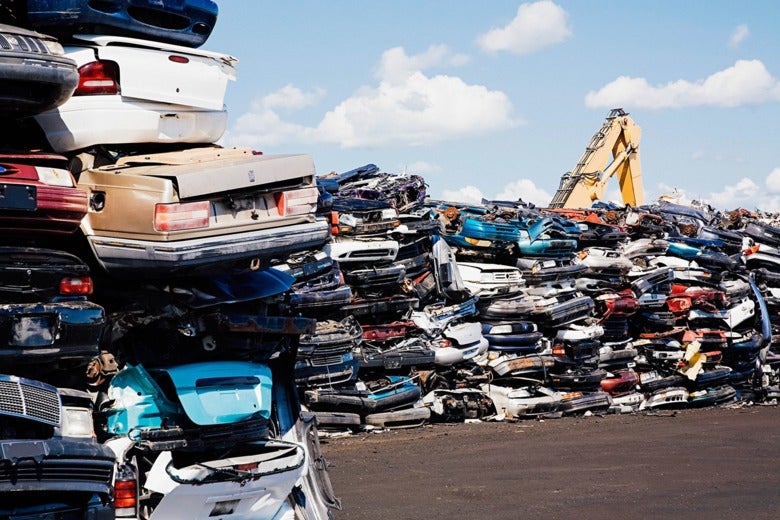 Cars in a scrap yard.
