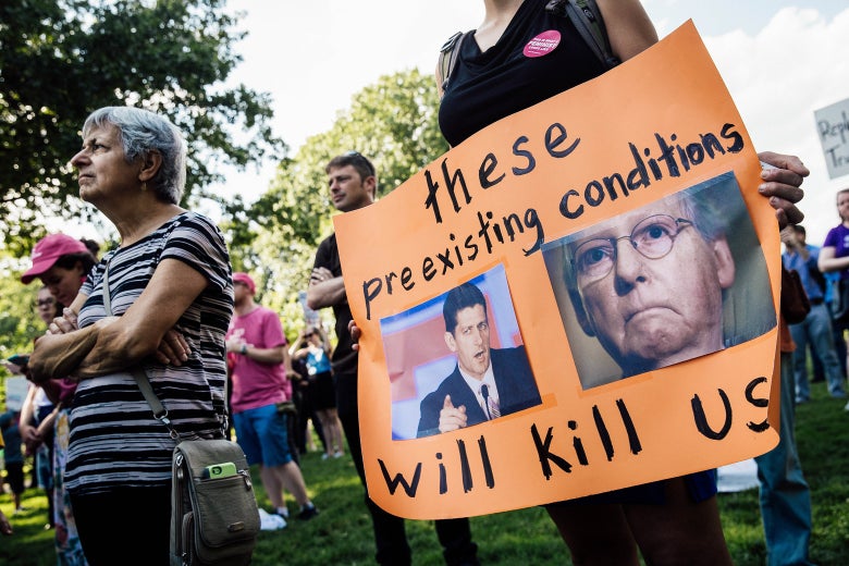 Protesters rally against the GOP health care plan on July 26, 2017.