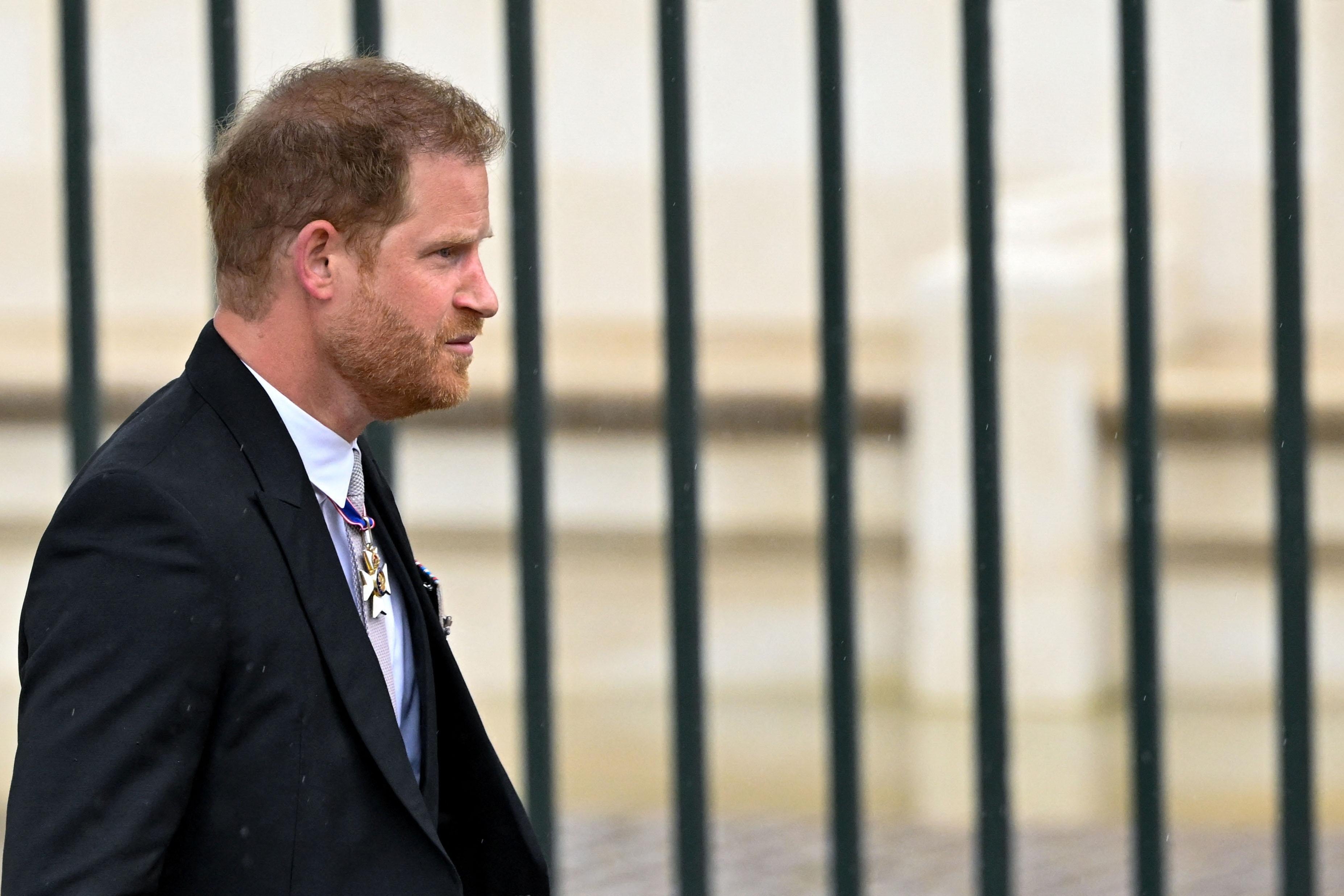 LONDON, ENGLAND - MAY 06: Prince Harry, Duke of Sussex arrives to attend the Coronation of King Charles III and Queen Camilla on May 6, 2023 in London, England. The Coronation of Charles III and his wife, Camilla, as King and Queen of the United Kingdom of Great Britain and Northern Ireland, and the other Commonwealth realms takes place at Westminster Abbey today. Charles acceded to the throne on 8 September 2022, upon the death of his mother, Elizabeth II. (Photo by Toby Melville - WPA Pool/Getty Images)