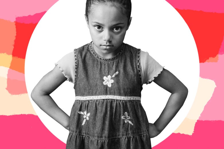 Young girl with her hands on her hips looking frustrated.