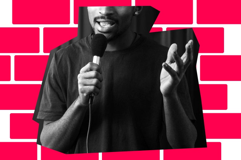 A man talking into a mic, in front of a graphic background of a brick wall.