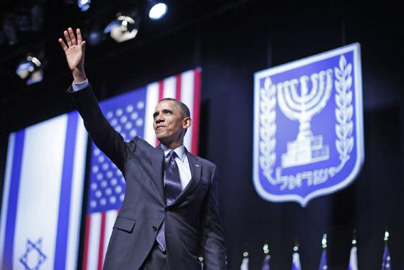 U.S. President Barack Obama acknowledges the audience after delivering a speech on policy at the Jerusalem Convention Center, March 21, 2013.