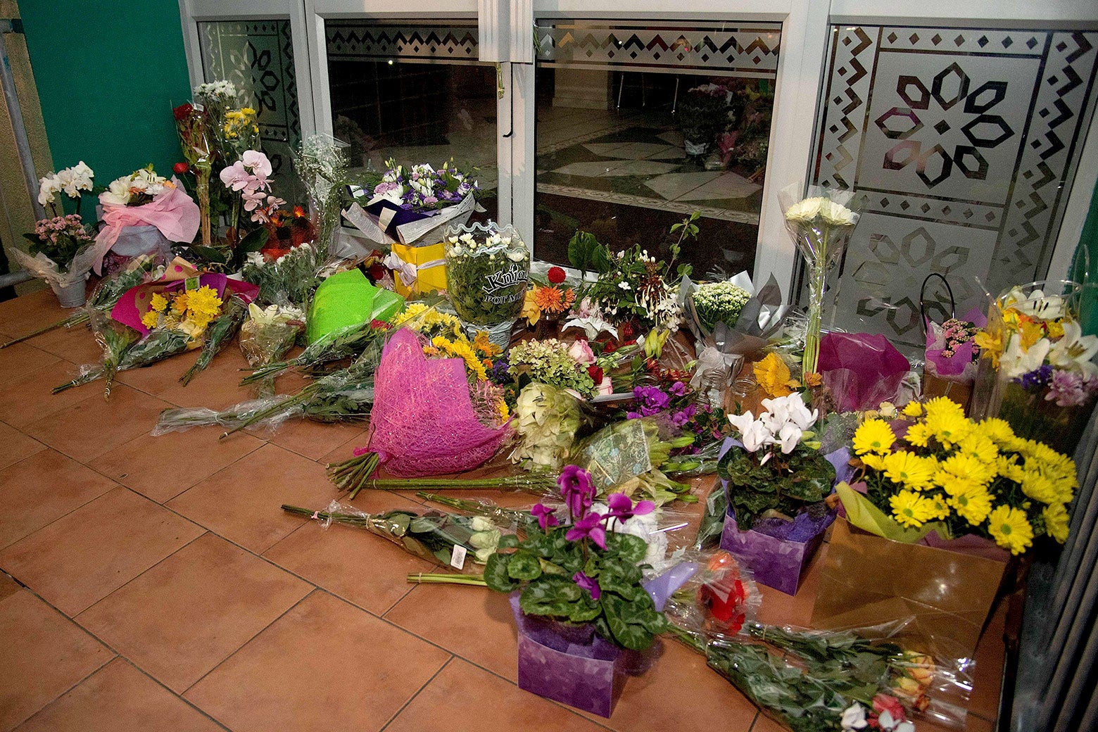 Flowers are placed on the front steps of the Wellington Masjid mosque.