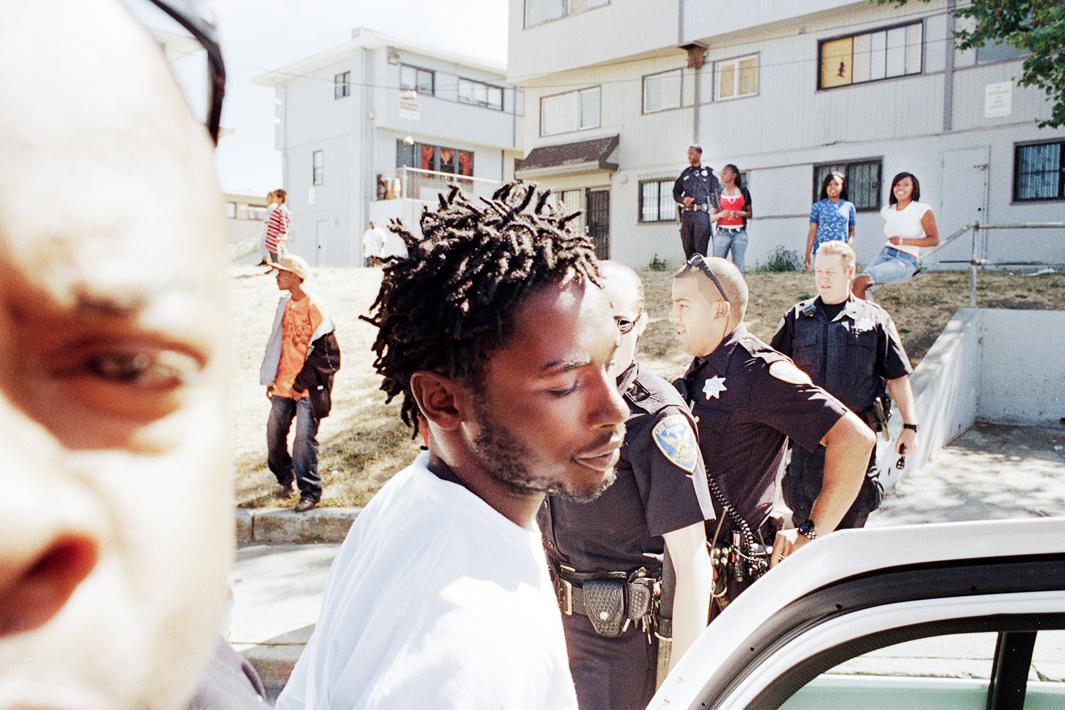 After a lengthy chase, Jermaine Jackson is arrested by police officers in the Hunters Veiw housing projects in Hunters Point. With the amount of families in Hunters View dwindling by the month, tension between police and remaining residents runs high. Jackson was charged with reckless driving police had surveyed earlier in the day.