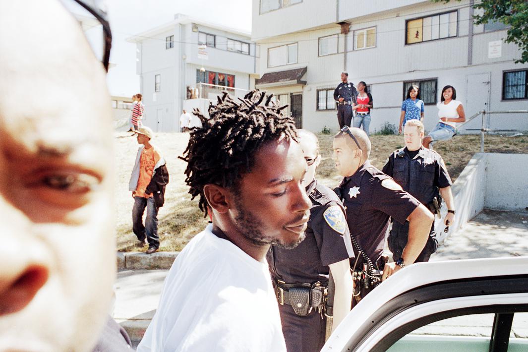 After a lengthy chase, Jermaine Jackson is arrested by police officers in the Hunters Veiw housing projects in Hunters Point.  With the amount of families in Hunters View dwindling by the month, tension between police and remaining residents runs high.  Jackson was charged with reckless driving police had surveyed earlier in the day.