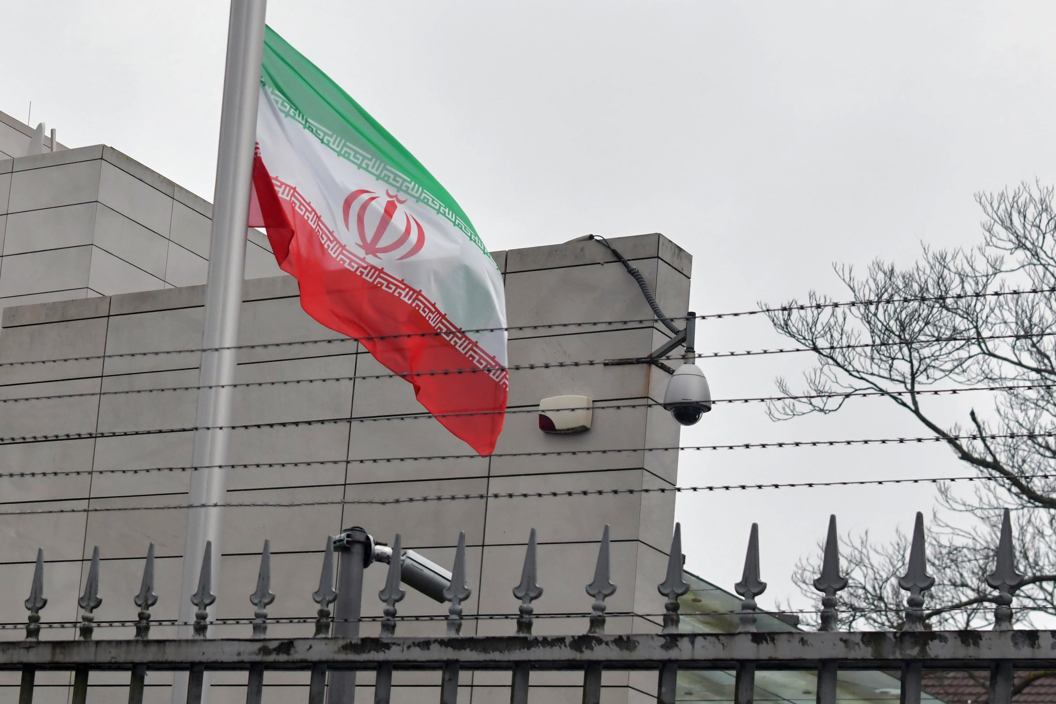 The Iranian flag at half-mast outside the Iranian Embassy in Berlin.