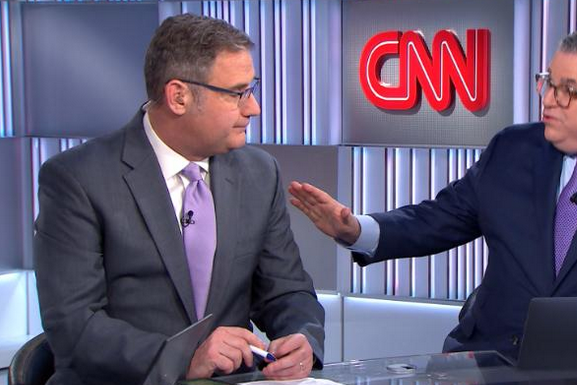 CNN political analyst Mark Preston and CNN political director David Chalian on air awaiting Iowa caucus results on Monday Feb. 3, 2020.