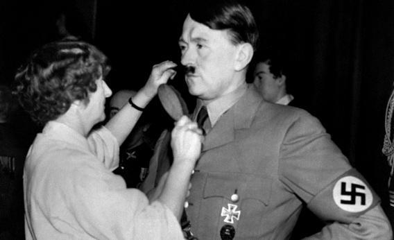 A picture released in 1938 shows the wax figure of German Nazi Chancellor Adolf Hitler having his moustache combed by a hairdresser at Madame Tussauds Wax museum in London. 