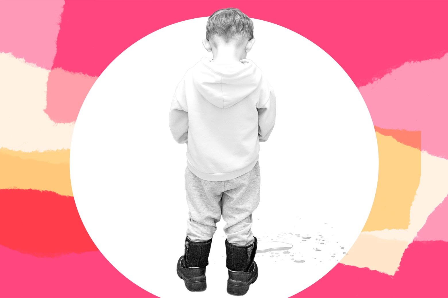 A kid peeing on the floor.