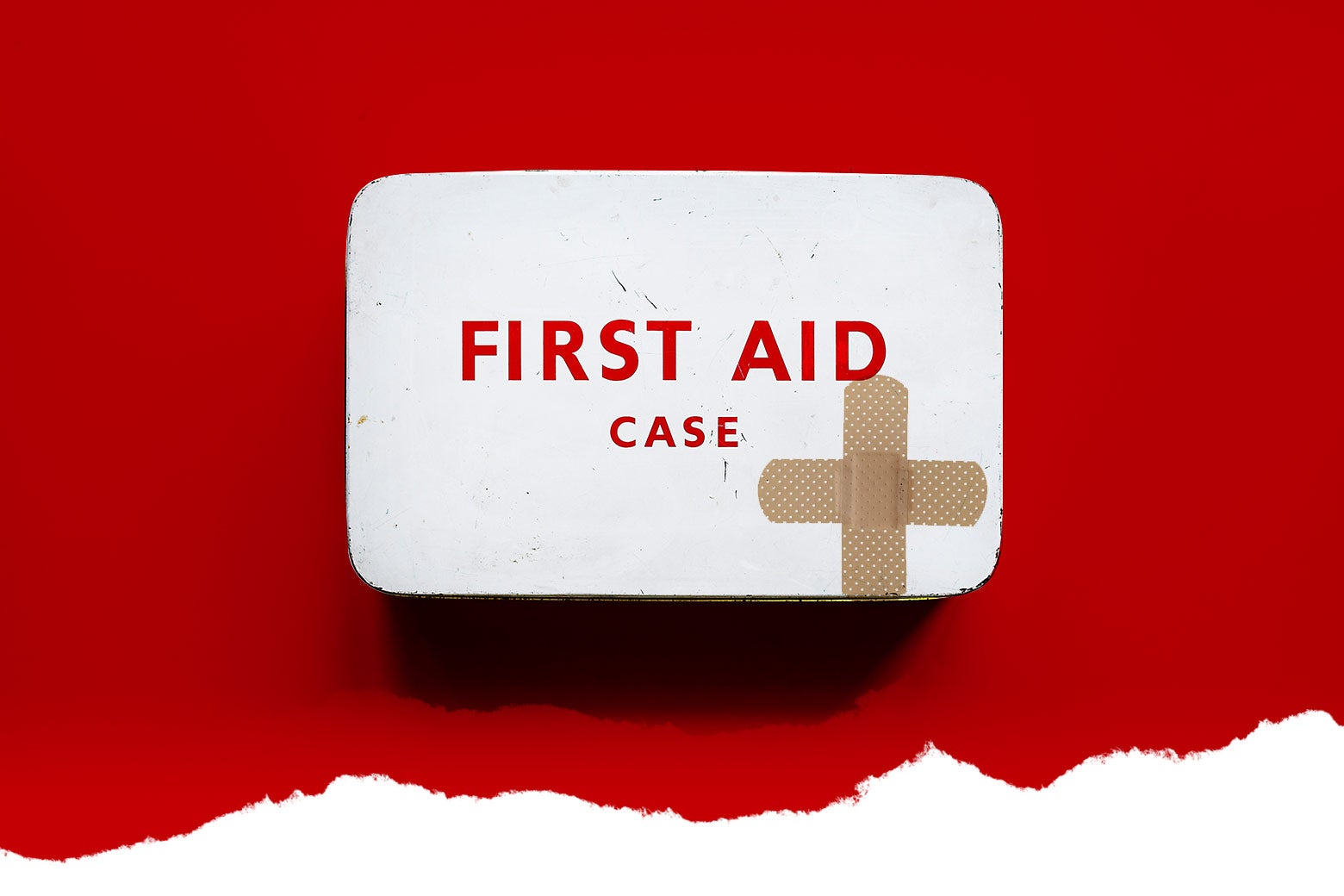 A first-aid kit with crossed Band-Aids