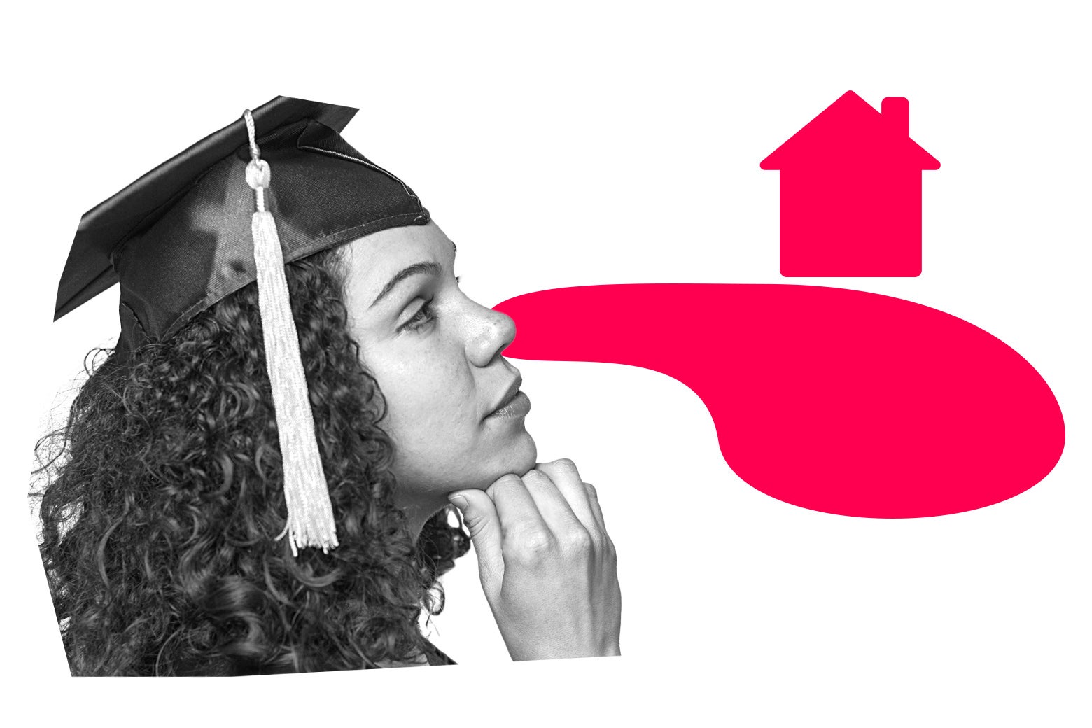 Young woman in a graduation cap looking off at a house on a lake.