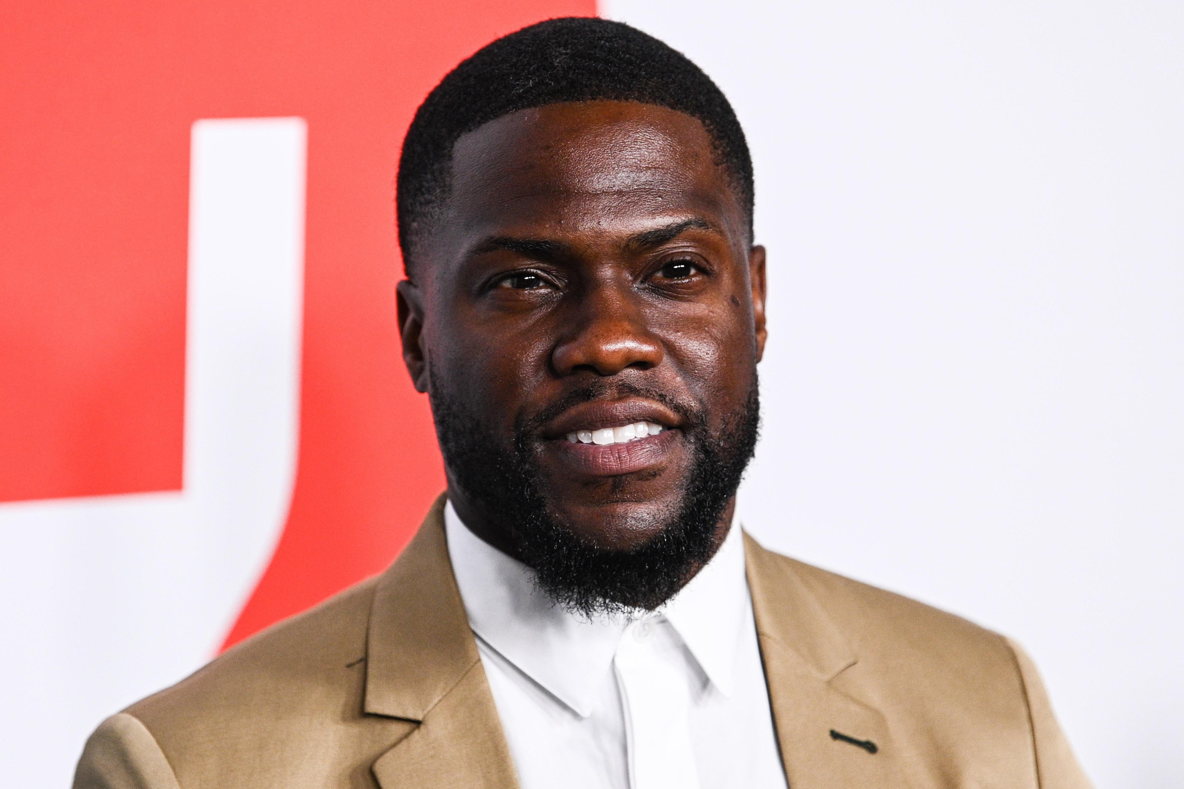 Kevin Hart on a red carpet.