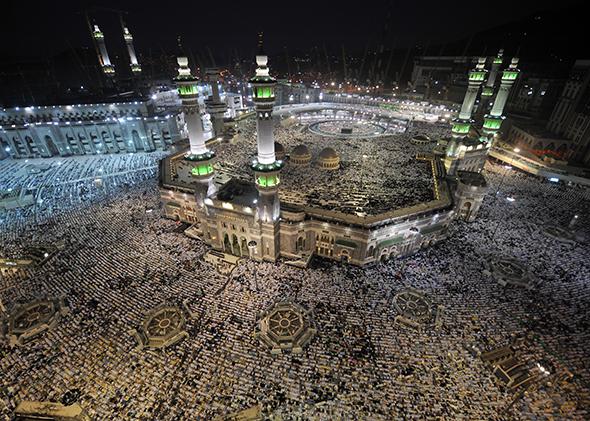 Pilgrims participating in the Hajj perform evening prayers in Mecca's Grand Mosque on Oct. 8, 2013.