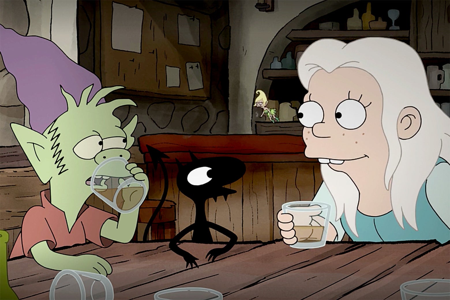 In a scene from Matt Groening's Disenchantment, Bean (Abbi Jacobson) shares a drink with her companions Elfo (Nat Faxon) and Luci (Eric André).