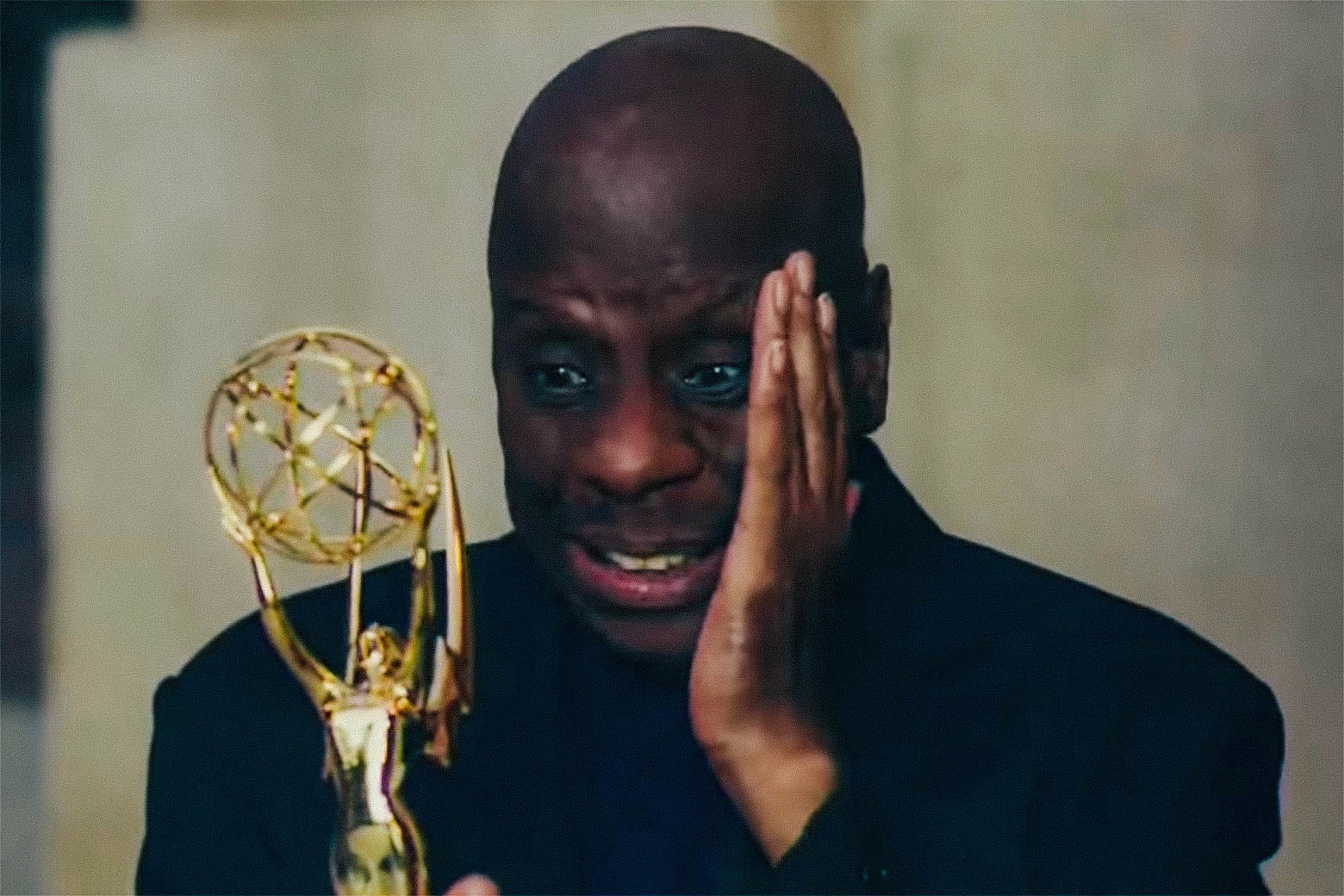 Jimmie Walker, holding a Reparation Emmy.