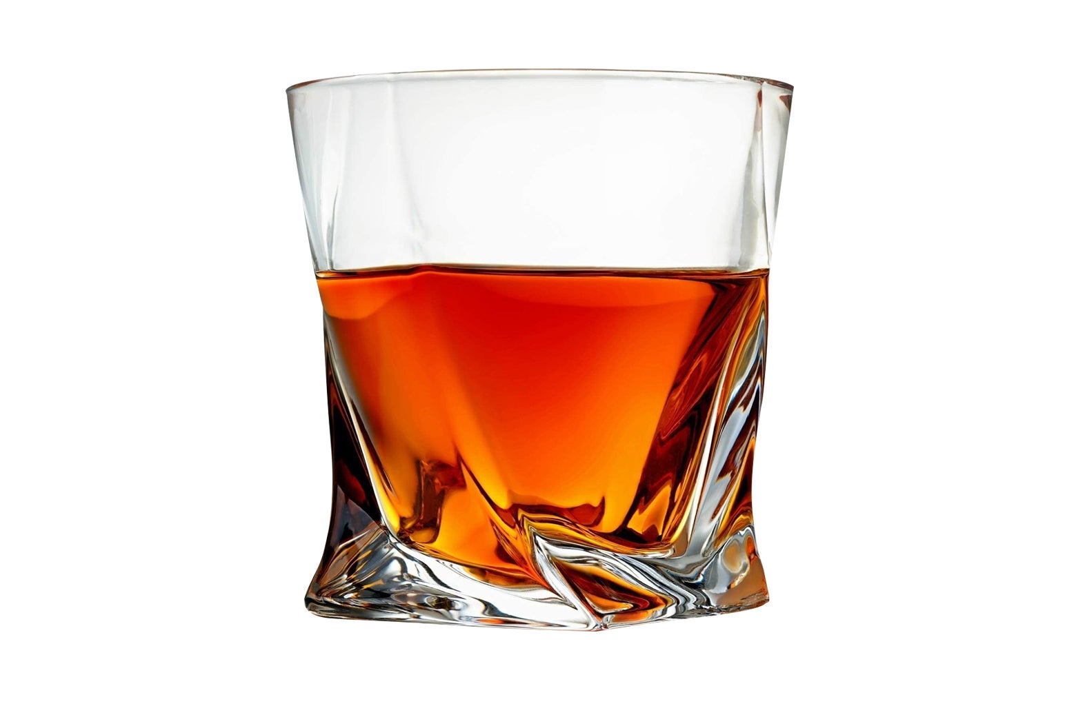 A glass with whiskey in it.