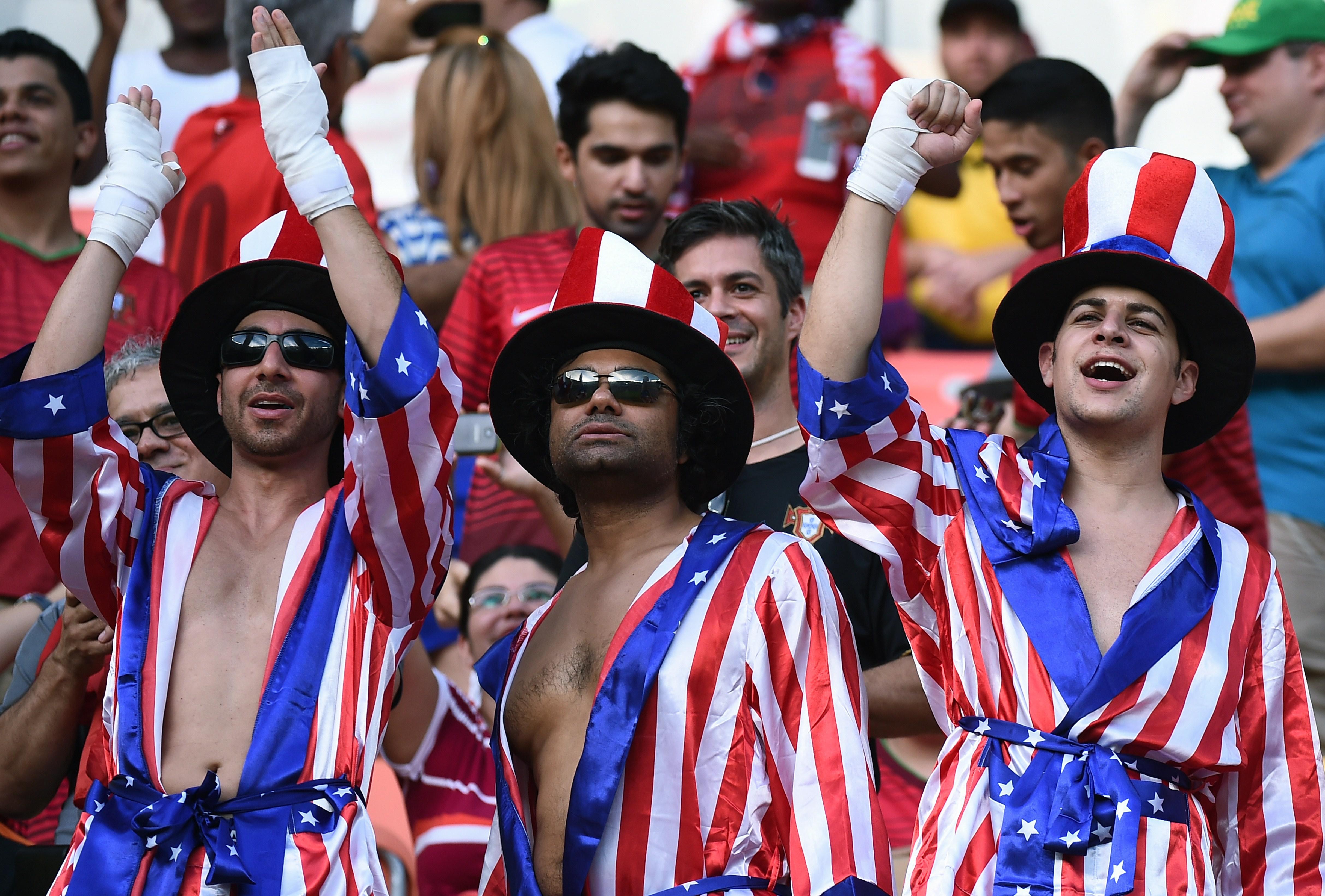U.S. fans cheer before the start of the World Cup match between the U.S. and Portugal in Manaus, Brazil, on June 22, 2014.