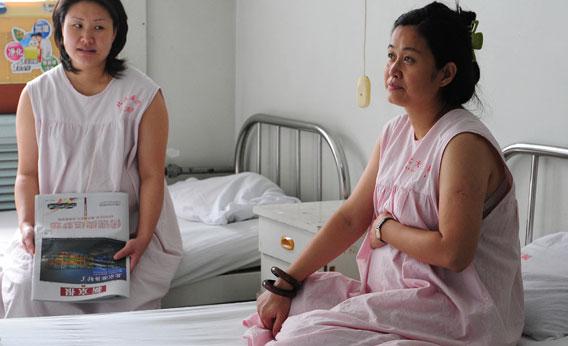 Pregnant women share a room in the obstetrics ward at the Peking University First Hospital in Beijing