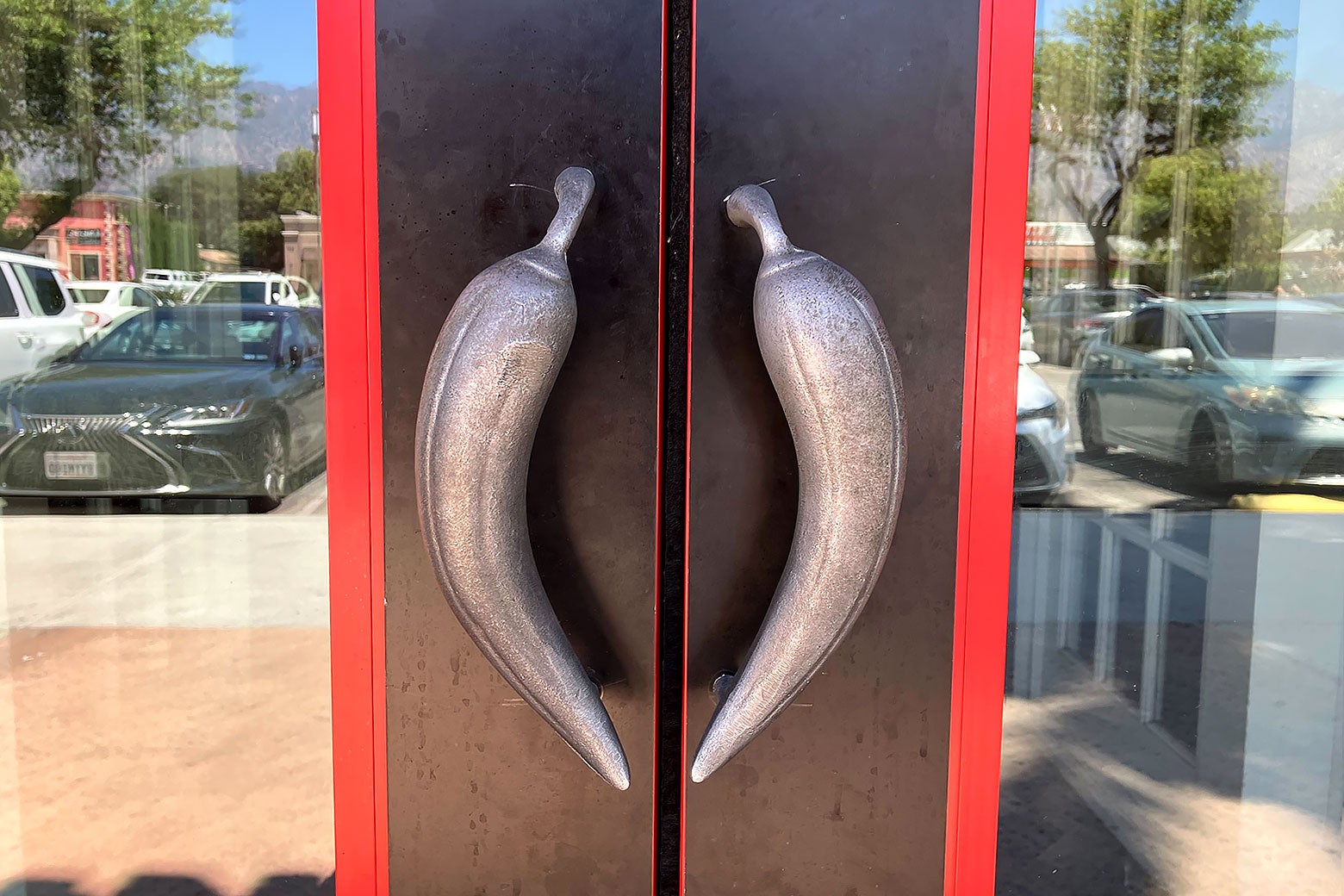 The door handles of a Chili's, which look like chile peppers.