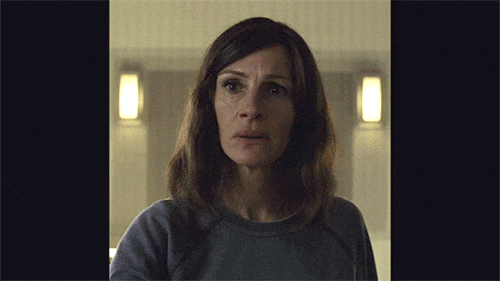 Julia Roberts as Heidi, gulping and looking upset.