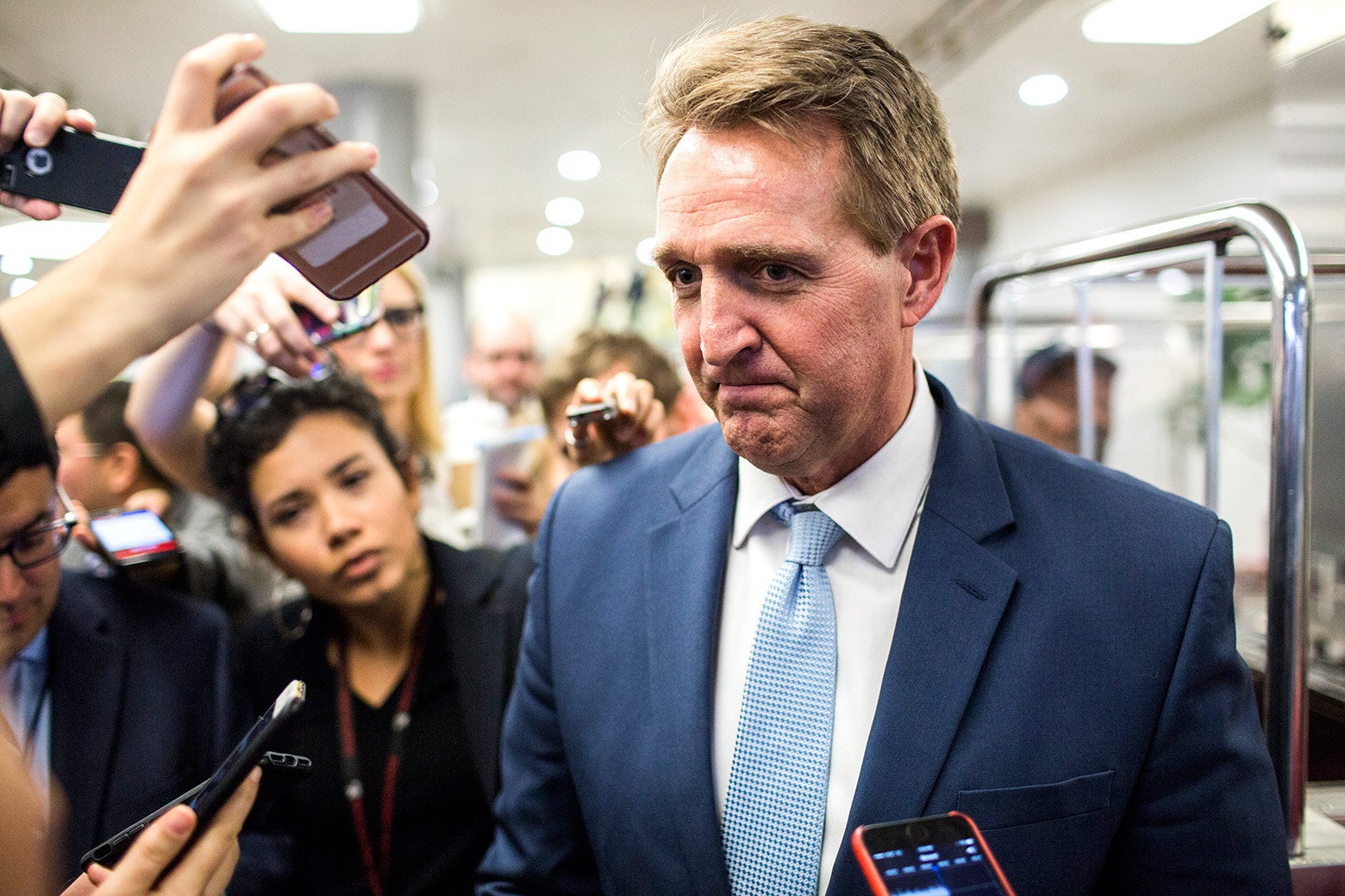 Sen. Jeff Flake (R-AZ) speaks to reporters following a vote on Capitol Hill on January 11, 2018 in Washington, DC. 